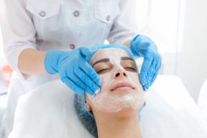Woman having Facial Care